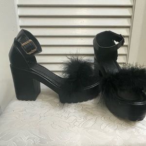 Fuzzy black ankle strap heel